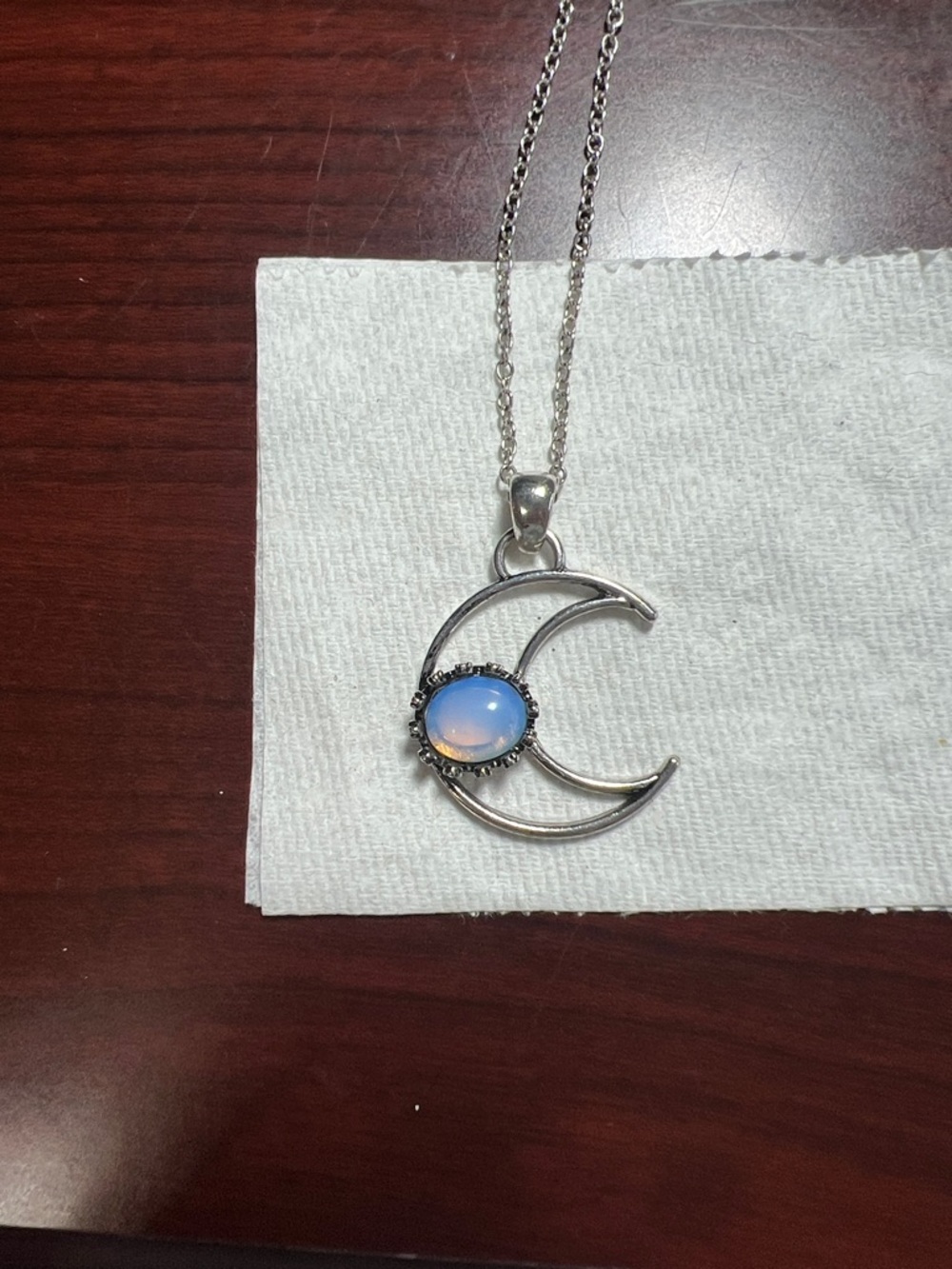 Silver Crescent Moon Necklace with Blue Opalescent Stone